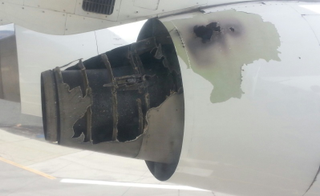 Illustration for article titled Passenger films one of his airplane's engines on fire